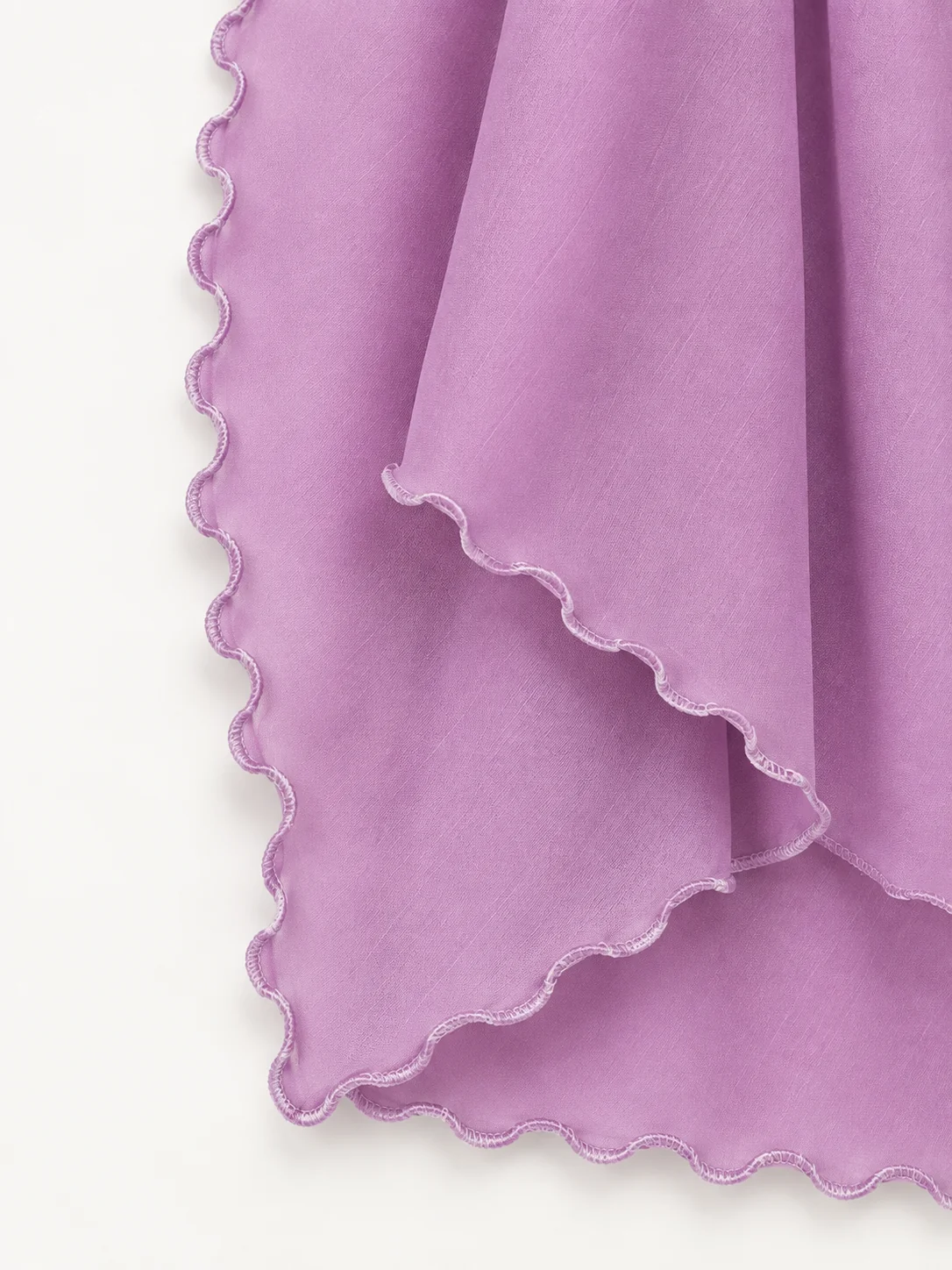 Pleat Edge shown as a finished hijab, hanging